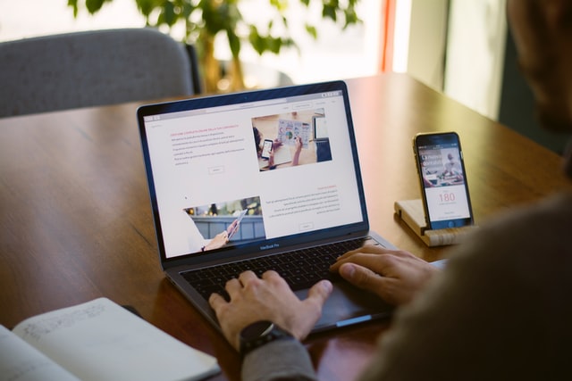 person-sitting-while-using-laptop