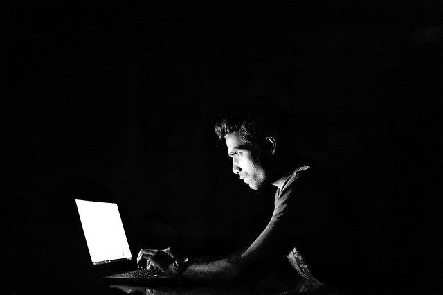 man-hacking-cyber-black-and-white-crime