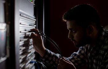 man-black-and-white-working-cloud-hosting